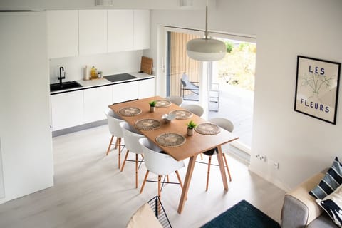 The dining table is large and sits 6 persons comfortably