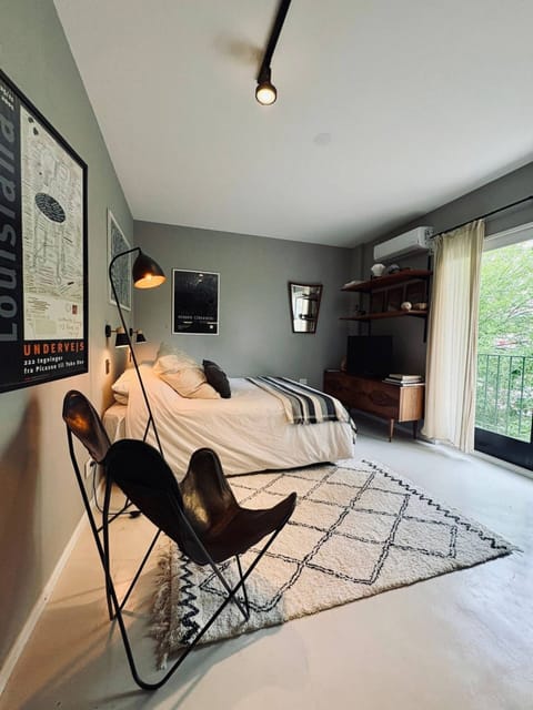 Stylish bedroom with balcony light