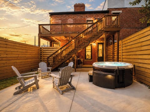 Welcome to Louisville Lore! Enjoy a private fenced patio with hot tub, grill, and outdoor seating