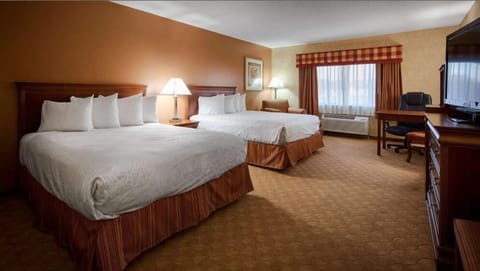 Deluxe Room, 2 Queen Beds, Non Smoking | Desk, laptop workspace, iron/ironing board, bed sheets