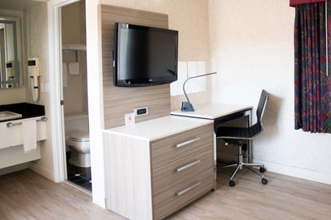 Premium bedding, pillowtop beds, blackout drapes, free WiFi