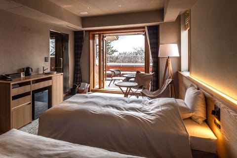Deluxe Twin Room with Sauna (Extra Bed Provided for 3rd Guest,Non Smoking) | Minibar, blackout drapes, free WiFi, bed sheets