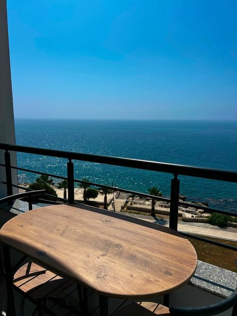 Luxury Suite, Balcony, Sea View | Outdoor dining