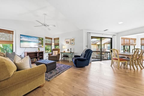 Living and Dining Area, Open Layout - The open living and dining area seats the group and opens directly to the covered private balcony.