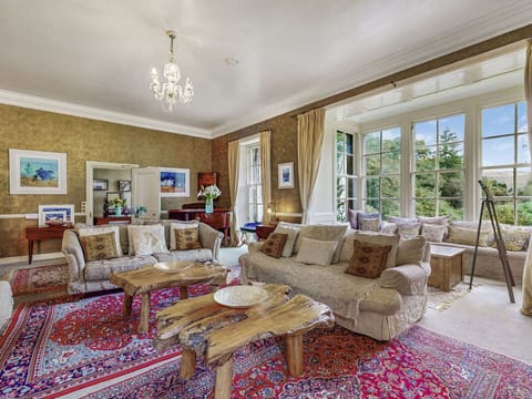 Furniture, Interior Design, Wood, Couch, Ceiling, Flooring, Home, Floor, Living Room, Chair