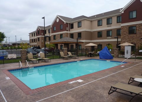 Heated outdoor pool open daily for guests — a refreshing retreat after a day exploring Bowling Green
