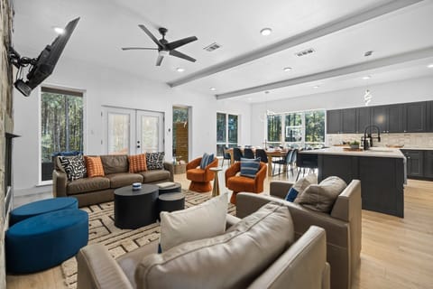 Open-concept living at it's best! The kitchen and living room flow together, keeping everyone connected from morning coffee to late-night lounging 