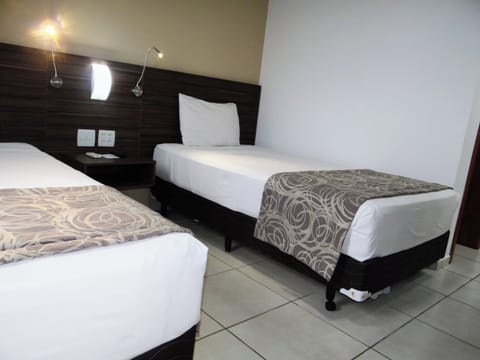 Stretch out with twin beds—ideal for friends or family stays.