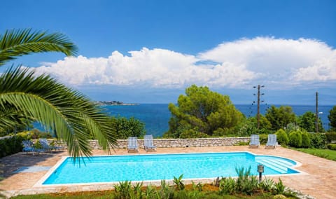 Outdoor swimming pool with panoramic views of the Messinian Gulf and surrounding greenery