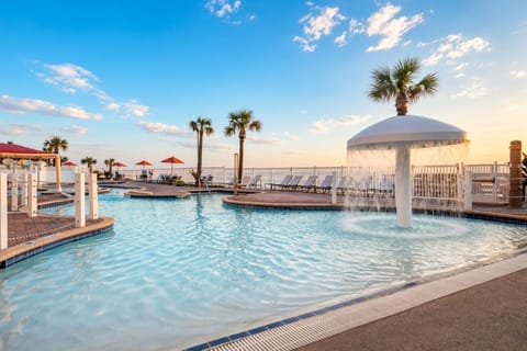 Outdoor Pool • Mushroom Fountain, Lounge Chairs & Ocean Views