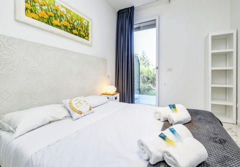 Apartment, Patio, Garden View | Iron/ironing board, WiFi (free)