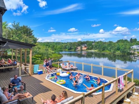 Enjoy the swimming pool, lake views, and a variety of backyard amenities designed for relaxing, unwinding, and making the most of your stay.