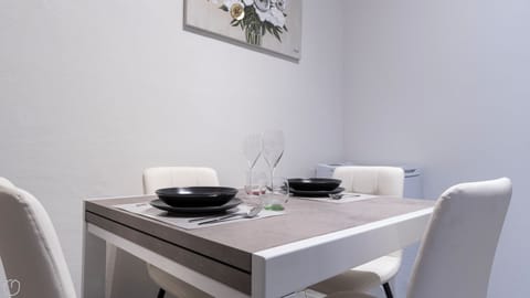 Apartment (1 Bedroom) | Living area | 32-inch Smart TV with cable channels