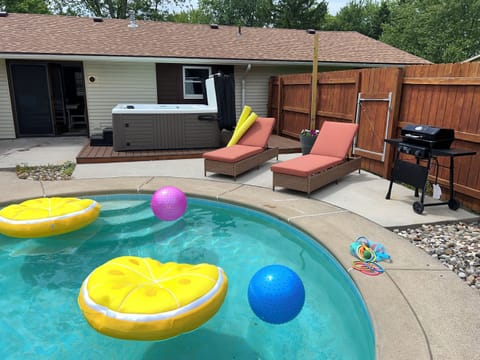 Unwind in this private backyard oasis in Fort Wayne. Our hot tub is ready for your evening soak after a day exploring the city, and the seasonal pool is the spot for sunny afternoon fun with your group.