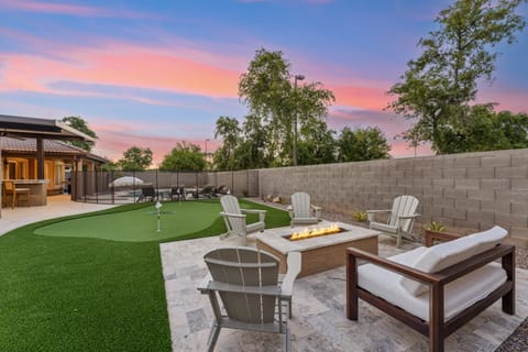 Putting green and fire-pit.
