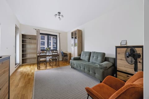 Warsaw apartment with private underground parking, balcony & great location in Wola | Book now with Rentujemy
