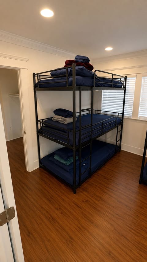 Premium bedding, down comforters, memory foam beds, laptop workspace