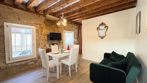 Apartment (1 Bedroom) | Living area | 32-inch TV with cable channels