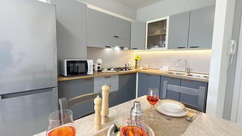 Apartment (1 Bedroom) | Private kitchen | Espresso maker, microwave, stovetop, dishwasher