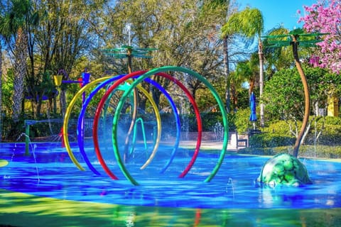 Colorful splash pad for kids to cool off and play.