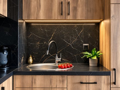 Elite Apartment, City View | Private kitchen | Espresso maker, electric kettle, highchair, griddle