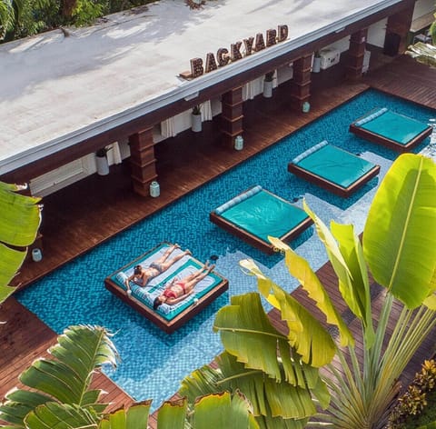 Outdoor pool, open 8 AM to 8 PM, cabanas (surcharge), pool umbrellas