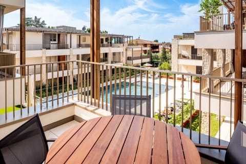 Private terrace overlooking the residence's pool