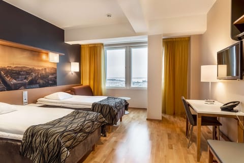 Standard Room (Family Three) | Minibar, in-room safe, desk, iron/ironing board