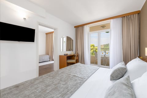 Double or Twin Room, Balcony, Sea View | Minibar, desk, free cribs/infant beds, free WiFi