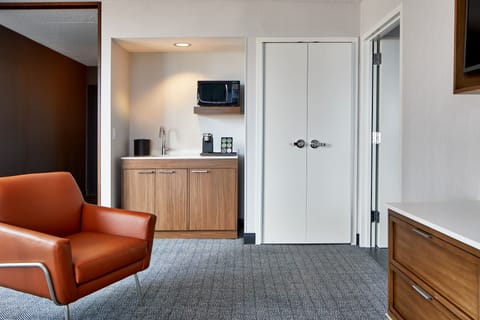 Suite, 1 King Bed with Sofa bed, Balcony | Living area | 37-inch Smart TV with cable channels, TV, Netflix