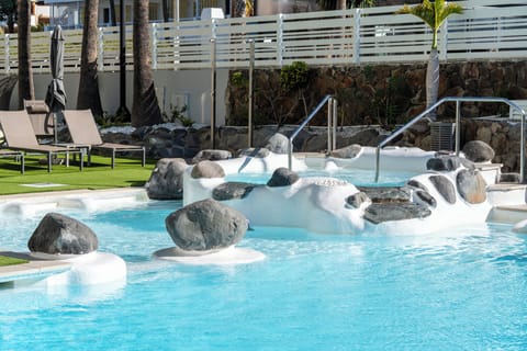 Outdoor pool, open 10 AM to 6 PM, sun loungers