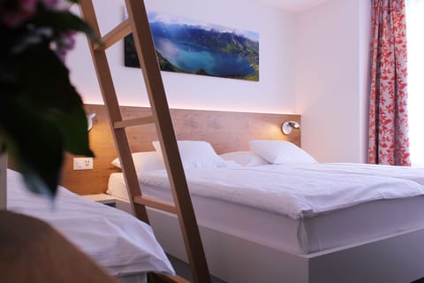 Superior Quadruple Room, Mountain View, Mountainside | Hypo-allergenic bedding, in-room safe, desk, laptop workspace