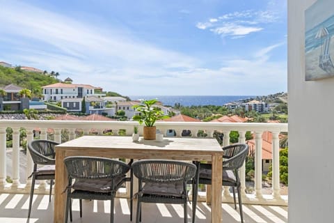 Stunning views over the resort, golf course and sea - perfect for your morning coffee!