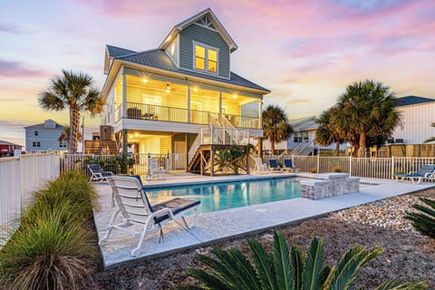 Watch the sky turn pink as the heated pool glows by the door.