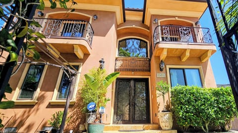 A summer day, exterior outdoor, property entrance, daytime