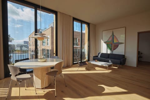 Living room with sea view and solid oak wood floors 