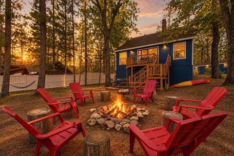 Evening fire pit on the lakeside lawn