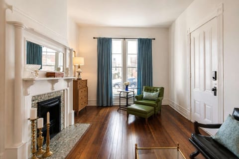 Living Room: Relax in a cozy living room with comfortable seating, warm natural light, and a welcoming atmosphere, perfect for unwinding after a full day of exploring.