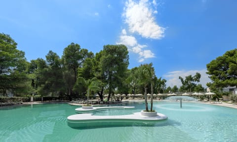 Indoor pool, seasonal outdoor pool, pool umbrellas, sun loungers