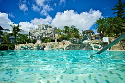 Outdoor pool, open 8:30 AM to 5:00 PM, pool umbrellas, sun loungers