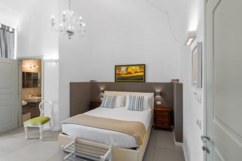 Deluxe Quadruple Room, City View | Blackout drapes, soundproofing, WiFi (free)