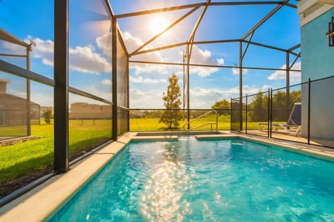 Private screened pool with sun loungers
