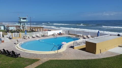 Outdoor pool, open 9:00 AM to 9:00 PM, sun loungers