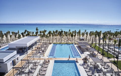 Outdoor pool, pool umbrellas, sun loungers