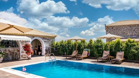 Balcony overlooking the pool and countryside