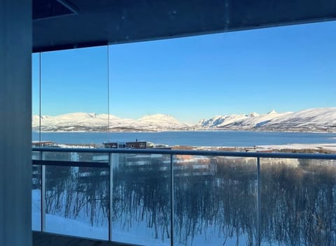 Panoramic ocean and mountain views from balcony