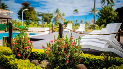 Outdoor pool, open 9:00 AM to 8:00 PM, pool umbrellas, sun loungers