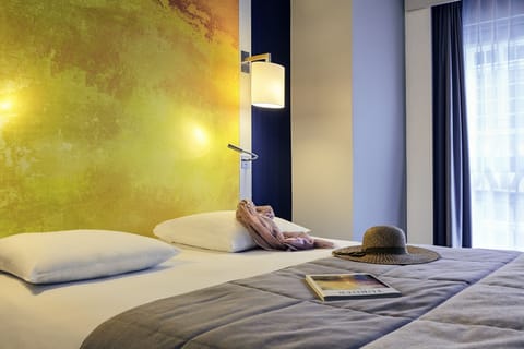 Minibar, in-room safe, blackout drapes, soundproofing