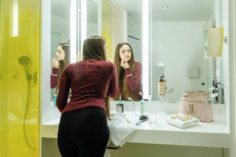 Eco-friendly toiletries, hair dryer, towels