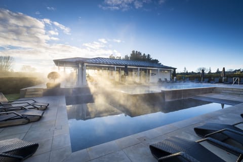 Outdoor pool, a heated pool, sun loungers